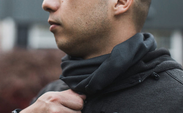 A person wearing the Shepherd's Wool Utility Cloth as a kerchief.